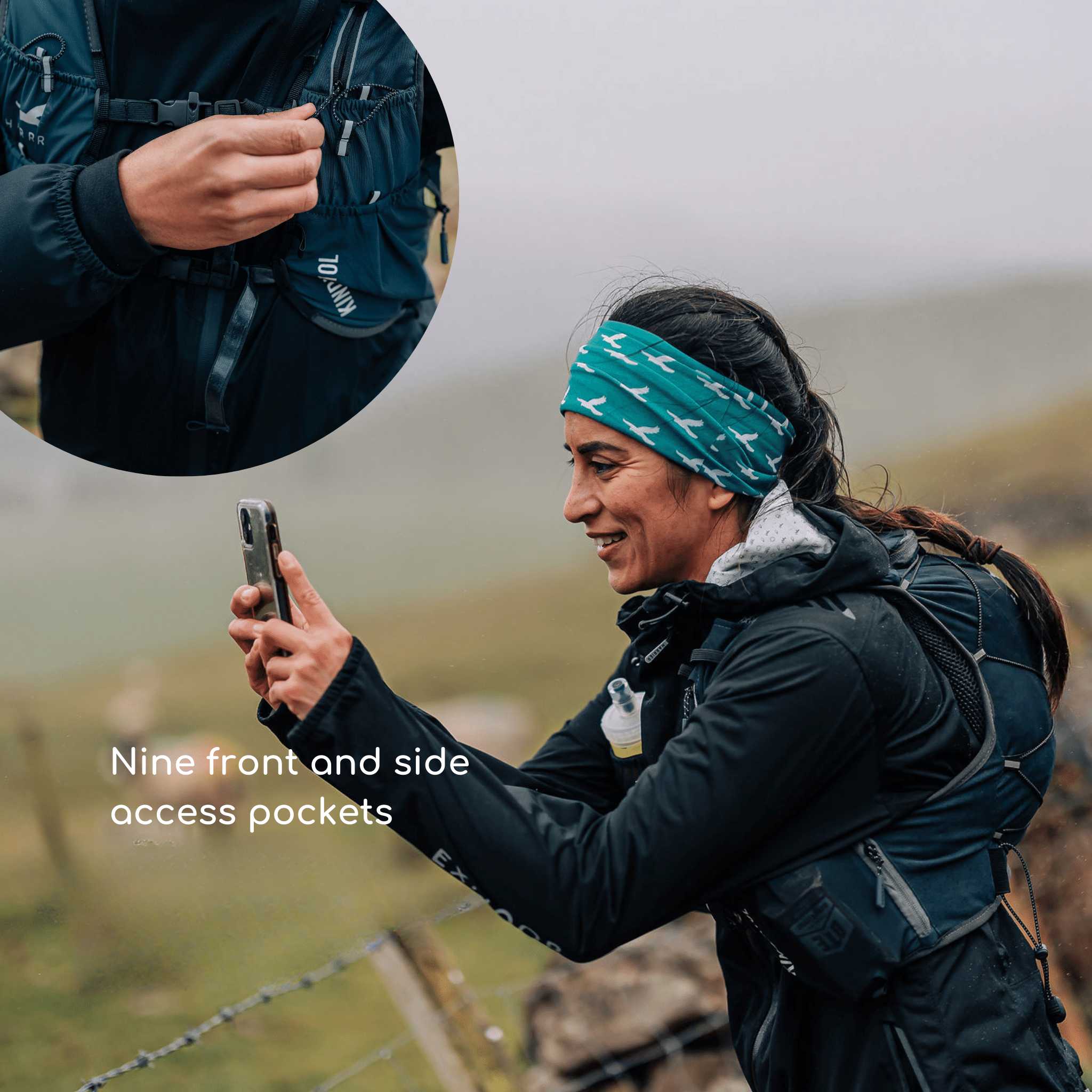 A woman wearing a running hydration vest, taking a picture of the countryside.