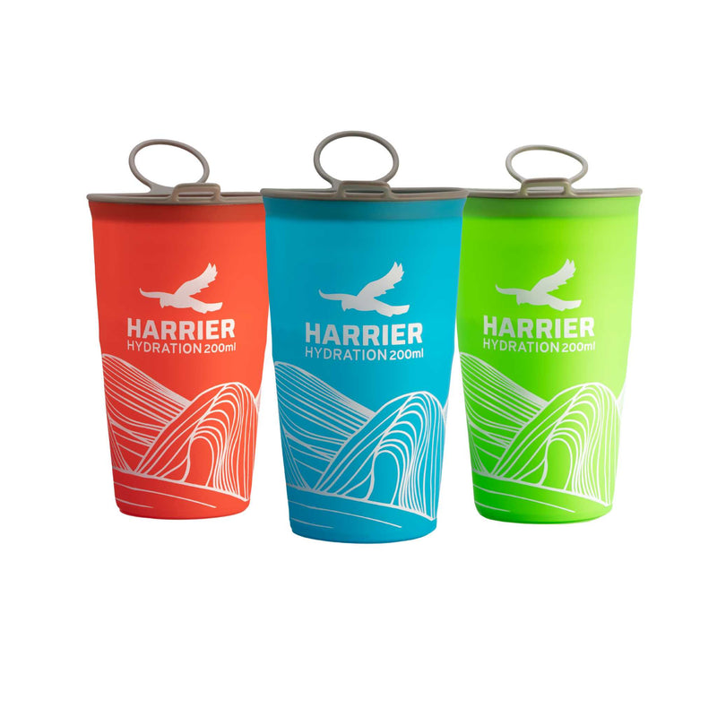 Three Harrier hydration cups in red, blue, and green on a white background
